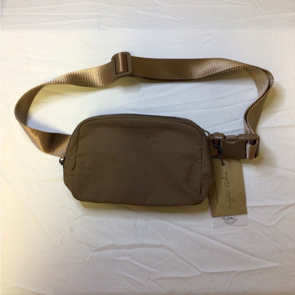 Tan Crossbody Bag with Adjustable Strap and Durable Fabric